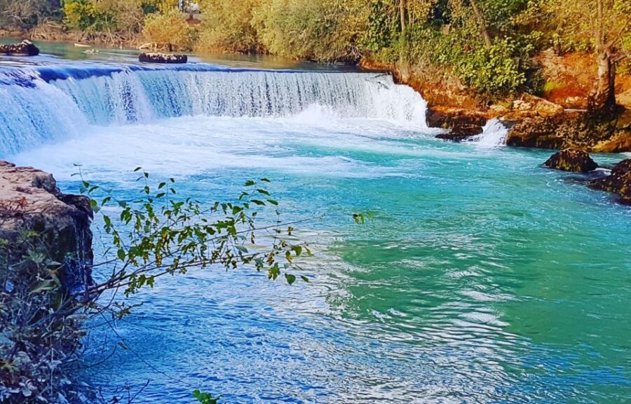 Manavgat River Cruise With Waterfall & Bazaar Tour - The boat guide language trick: English on the bus, German on the water