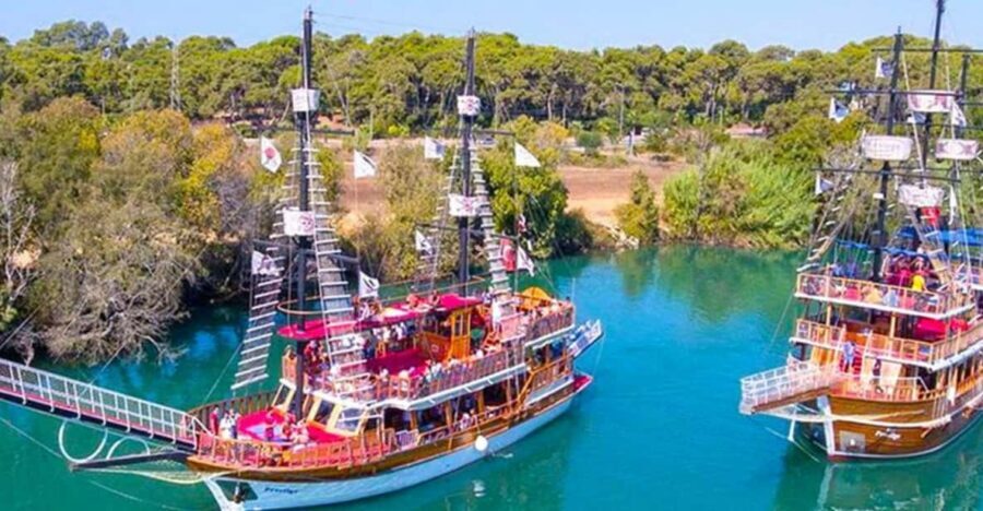 Side: Blue Lagoon Boat Trip with Swimming & Sunbathing - Onboard fun: animations, pirate-style energy, and a foam party