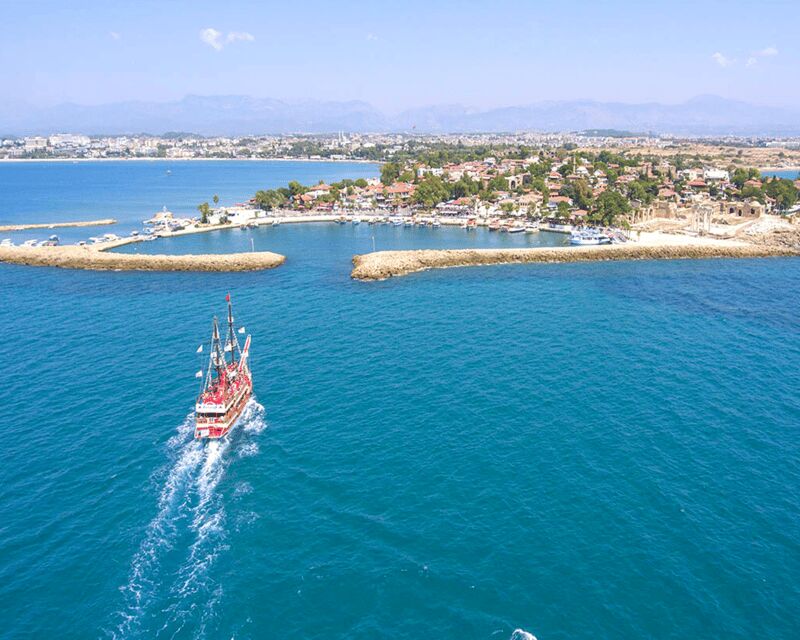Side: Blue Lagoon Boat Trip with Swimming & Sunbathing - Cruising past Side and Apollo: why the sea view is the whole point