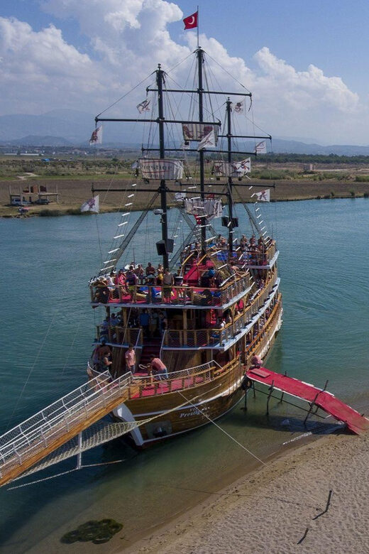 Side: Dolphin Island Boat Trip with Lunch & Unlimited Drinks - Swim Stops: How Long You Get, Where Shade Changes, What To Pack