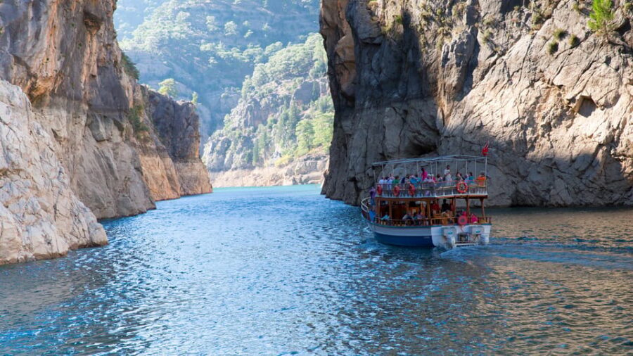 Side: Green Canyon Boat Trip & Bus Safari with Lunch - Riding the cabrio bus safari: orange gardens and mountain hairpins
