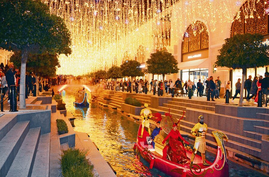 Side: Land of Legends Bus Transfers and Boat Parade - Your Land of Legends window: rides, waterpark fun, and the shopping break